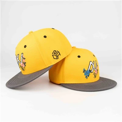 Gul platt broderad keps